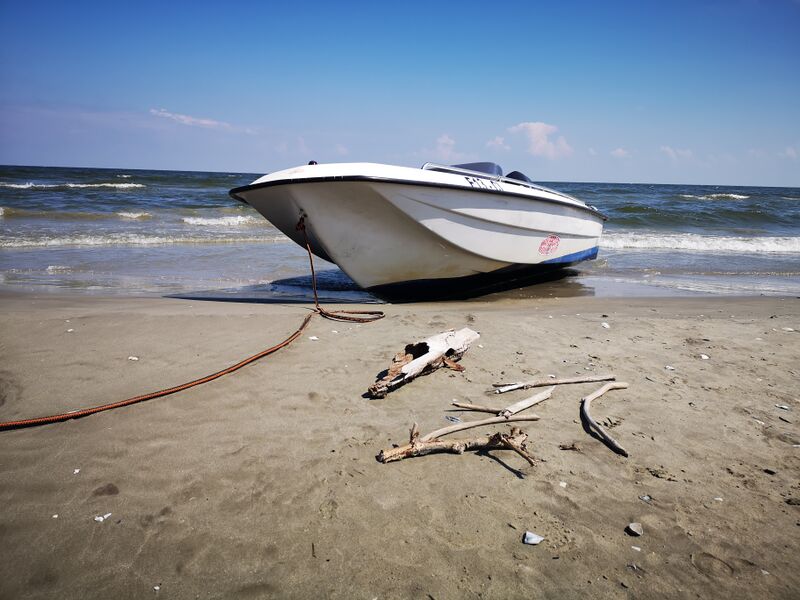 File:Libernesian Boat on a Black Sea Beach.jpg