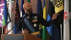 Grand Duke Travis from Westarctica giving a presentation on micronational conflicts