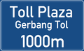 Toll plaza 1 km ahead