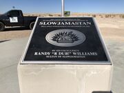 This concrete and aluminum monument was erected to commemorate Slowjamastan's Independence Day and is located on the edge of Independence Square.