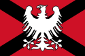 Red background, with black saltier, and a white eagle