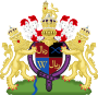 Coat of arms containing shield and crown in centre, flanked by lions